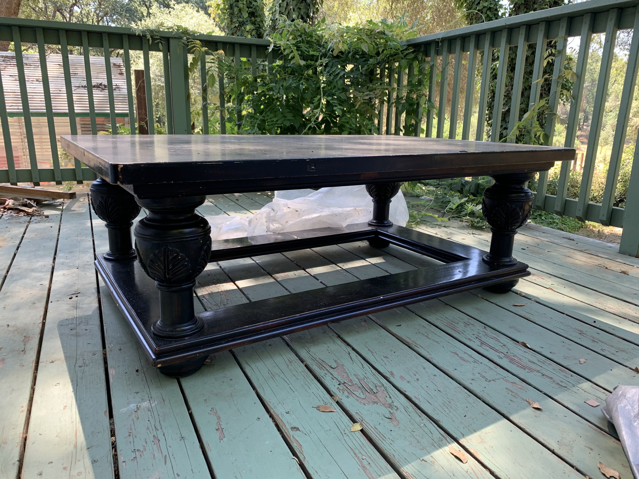 Dark coffee table before its painted transformation