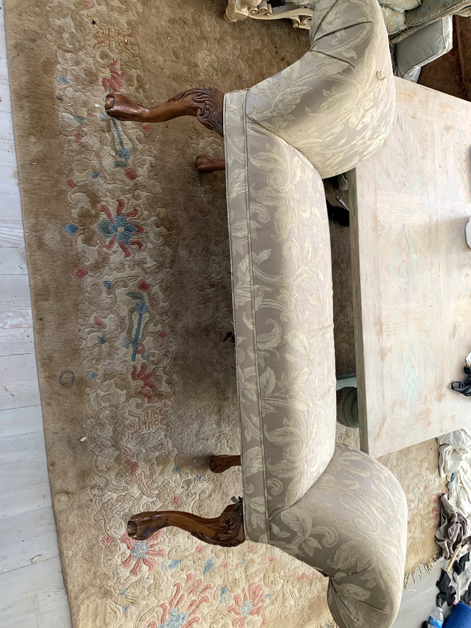Cream upholstered chair before it was transformed for the farmhouse entry
