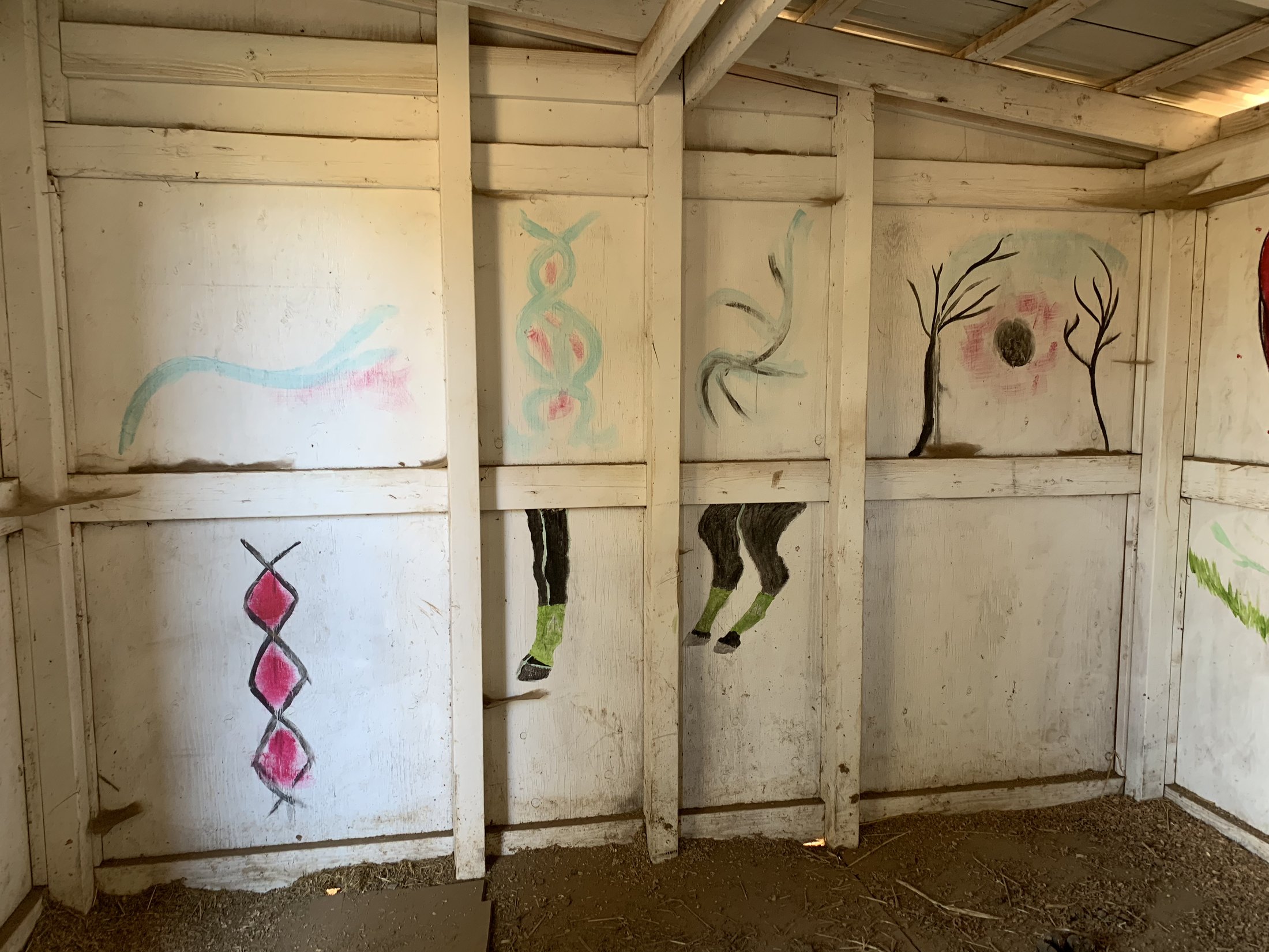 Painted details inside a horse stall on the California farm