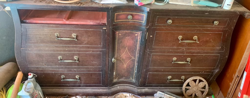 Worn bombe sideboard before restoration